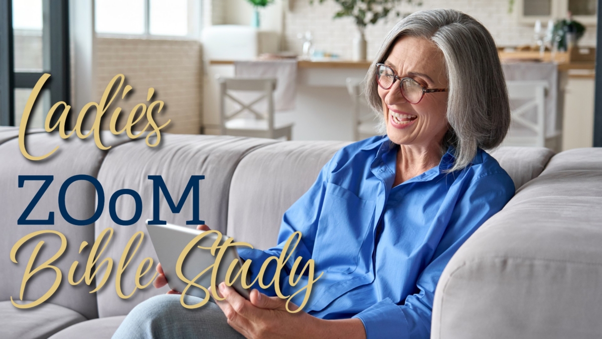 Lady in living room with tablet connecting with people online