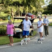 Two women and two men standing in line for pet prayer