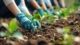 row of people with garden gloves on planting
