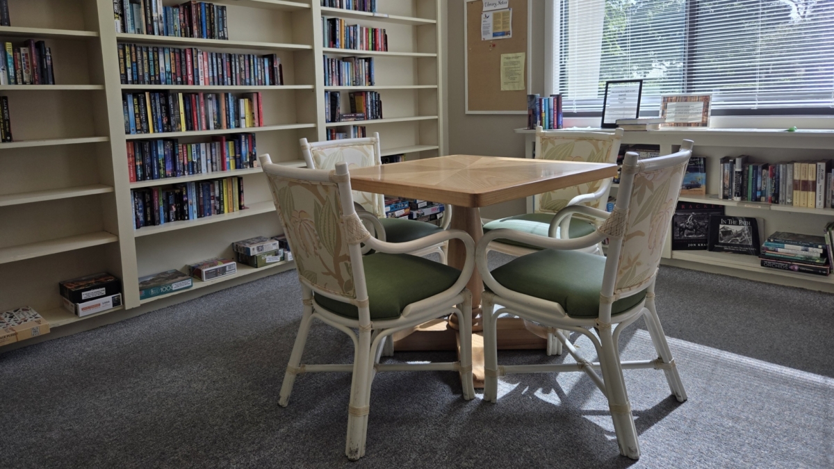 Library reading area Table with four chairs for reading area in library